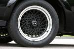 The wheels are GNX specific. They are 16-inch-diameter pieces and of a specific &ldquo;honeycomb&rdquo; design. The front and the rears are of different offsets. Front tires were 245/50/16 and the rears were 255/50/16. These lightweight wheels are different from the similar looking wheels used on Pontiac Firebirds of the era. Because of the larger rolling stock, the fenders were cut and molded plastic fender flairs were added to both enhance the look of the car, and keep all that rubber inside the fenders. Center caps were sourced from Pontiac and modified.  &raquo; Click to zoom ->