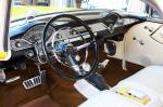A stock, but downsized steering wheel is Nick&rsquo;s tiller of choice and the stock dash has been left unmolested. We like the fact that it&rsquo;s not all cut up and digitized. The less doodads the better when you are dealing with a truly classic design like the tri-five Chevy dash.  &raquo; Click to zoom ->