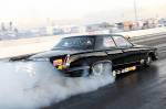 Sean making a burnout prior to a 6.62 at 211 mph during the 2009 March Meet.  &raquo; Click to zoom ->