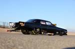 This all black beauty is all fiberglass. Custom built by the Renteria Brothers along with their friends at Kicker Kraft in Morgan Hill, California, the mold was made directly on the team's older steel race car body. Want a fiberglass Valiant body for yourself? It might cost you.  &raquo; Click to zoom ->
