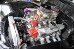 Here's the iron-free FE. It has been bored and stroked to 485ci. The motor uses Shelby aluminum block CSX# 741, a Scat crank, Scat Rods, Ross 12.5:1 pistons, a Comp 0.660-lift roller cam, Edelbrock Performer RPM aluminum heads, a factory 427 high riser dual-quad intake, and a pair of Chuck Nyutten tuned 750 Holley carbs. It made 610 hp on the dyno.  &raquo; Click to zoom ->