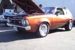 Besides the 401, 4 peed and retro cool Centerline wheels; the owner of this Gremlin clear coated the original paint in order to keep it shiney. The aged and cracked stripes will now look cool forever under the protective clear.  &raquo; Click to zoom ->