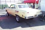This high riding '64 Chevelle Gasser was by far the cleanest at the show. Unlike the beater gassers cruising around all day, this one sat in the shade watching the parade of cars goi by.  &raquo; Click to zoom ->