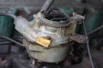 The carb is clean and the previous owner treated the fuel with Stabil before parking it. We sloshed some fuel in the carb, hit the key and the motor fired right up.  &raquo; Click to zoom ->