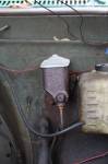 This single pot master cylinder is hooked to a remote vacum booster called a Bendix Hydro-vac.The actual unit it mounted on the frame of the truck underneath.  &raquo; Click to zoom ->