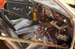The main problem with just dropping in a new engine and driving away was that decades of magazine-guy hacking on the wiring had left this mess. We took every scrap of wiring out of the car and started over with reproduction harnesses from Classic Industries.  &raquo; Click to zoom ->