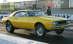 Here&rsquo;s another launch shot from Fontana. This junk looks like every small-block Camaro build from the &rsquo;60s to the &rsquo;90s, but we like it better than we did when it had 17s on it. Up next should be a better hoodscoop, Grump style. And a tunnel ram under it!  &raquo; Click to zoom ->