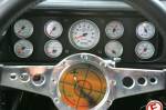 There are twin Auto Meter fuel-pressure gauges because the F-Bomb runs two banks of injectors and two complete Aeromotive fuel systems.  &raquo; Click to zoom ->