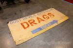 This sign is laying on the floor behind the Bug.  &raquo; Click to zoom ->