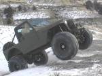 This was shot in North Dakota in 2003 when we picked up the Jeep from Pat Helgeson after he did a mechanical makeover on it. Freiburger snapped a front axle with too much throttle.  &raquo; Click to zoom ->