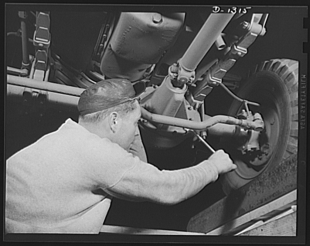 Worker Under dodge truck Worker under Dodge truck