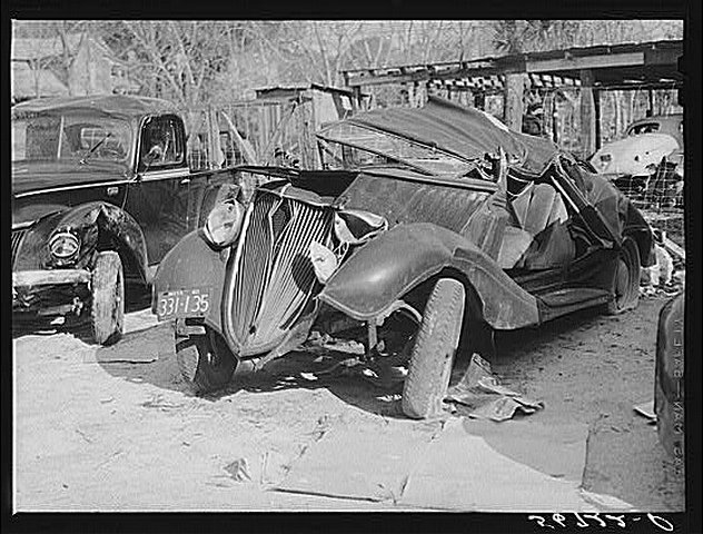 A wrecked car and truck A wrecked car and truck