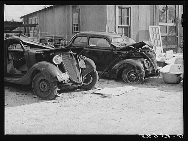 Another angle of the wrecked car and truck Another angle of the wrecked car and truck