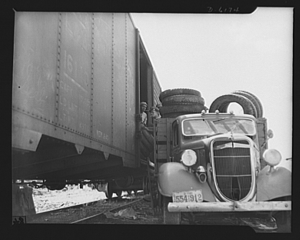 Tires being loaded onto junkyard truck Tires being loaded onto junkyard truck